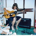 me and 2 of my guitars, my mother to the left
